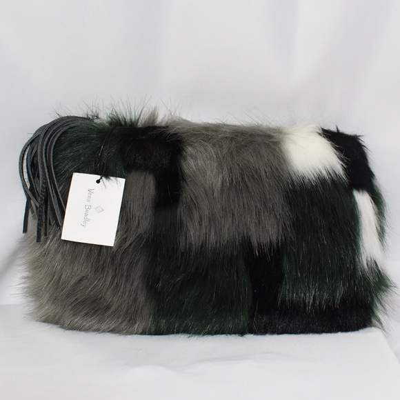 Vera Bradley Handbags - Vera Bradley SIBERIA Tassel Clutch Faux Fur NWT